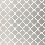 Moroccan-inspired silver geometric wallpaper with quatrefoil pattern by Schumacher