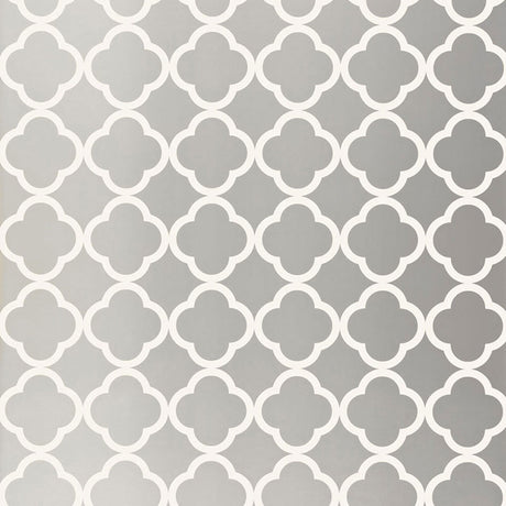Moroccan-inspired silver geometric wallpaper with quatrefoil pattern by Schumacher
