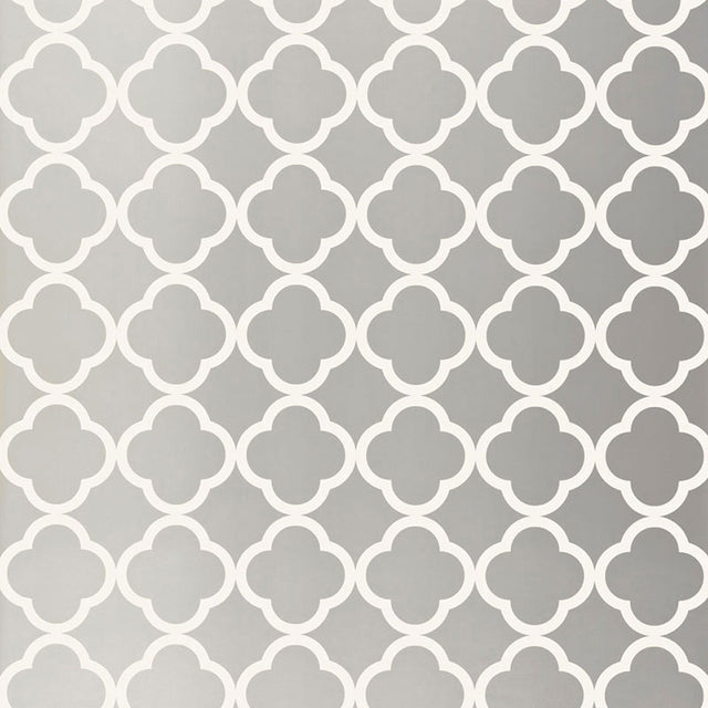 Moroccan-inspired silver geometric wallpaper with quatrefoil pattern by Schumacher