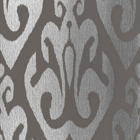 TOKAT wallpaper in graphite, a bold ikat-inspired pattern from Schumacher's Byzantium collection, shown in metallic silver and dark gray.