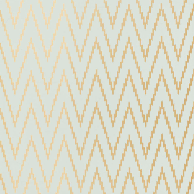 Kasari Ikat Aquamarine wallpaper by Schumacher featuring a zigzag chevron pattern in gold and light blue.