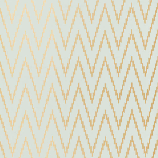 Kasari Ikat Aquamarine wallpaper by Schumacher featuring a zigzag chevron pattern in gold and light blue.