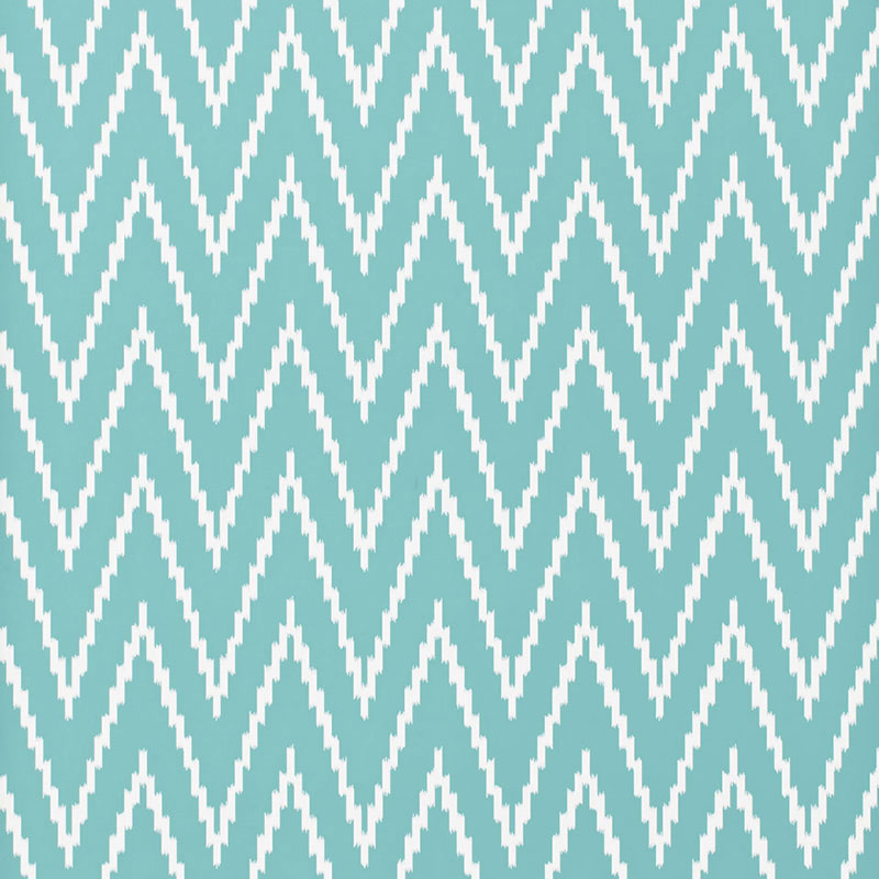 Kasari Ikat Azure wallpaper with a bold zigzag ikat pattern in blue and white by Schumacher.