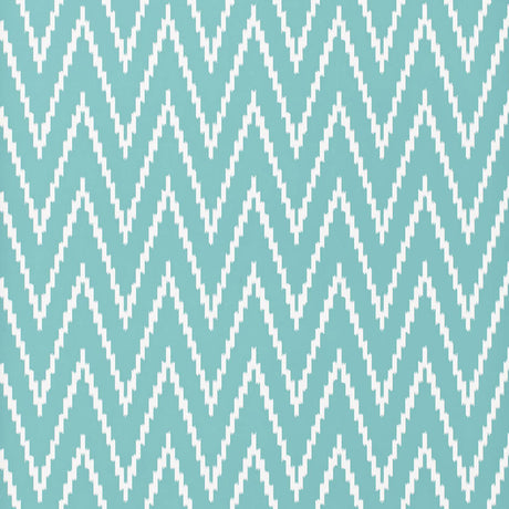 Kasari Ikat Azure wallpaper with a bold zigzag ikat pattern in blue and white by Schumacher.