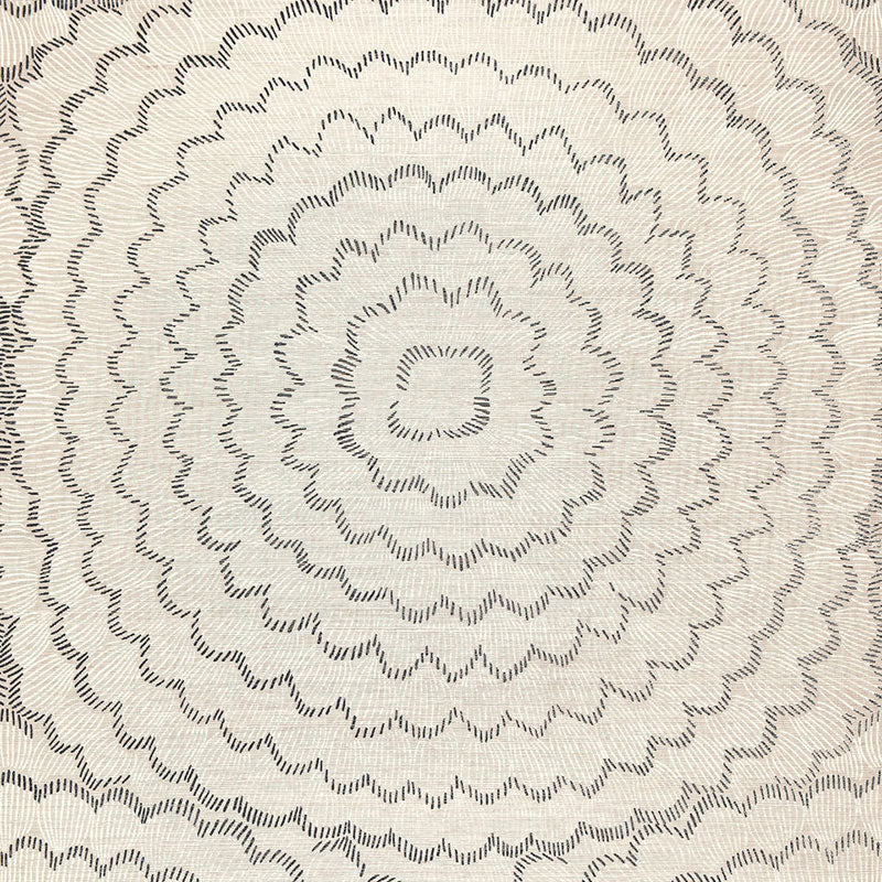 Feather Bloom Sisal wallpaper in Dove by Celerie Kemble for Schumacher, featuring overscale radiating blossoms on a natural sisal ground.