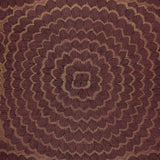 Feather Bloom Sisal wallpaper in Golden Plum by Celerie Kemble for Schumacher, featuring overscale blossoms in a radiating pattern on a natural sisal ground.