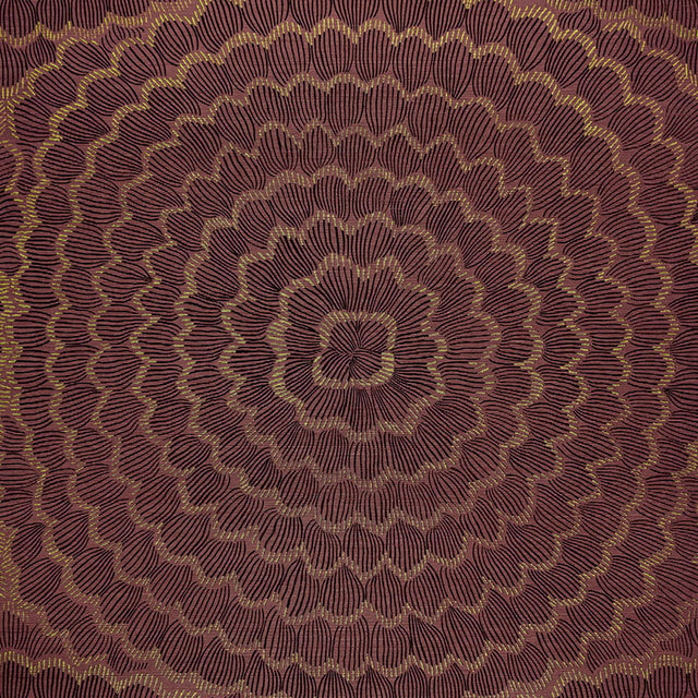 Feather Bloom Sisal wallpaper in Golden Plum by Celerie Kemble for Schumacher, featuring overscale blossoms in a radiating pattern on a natural sisal ground.