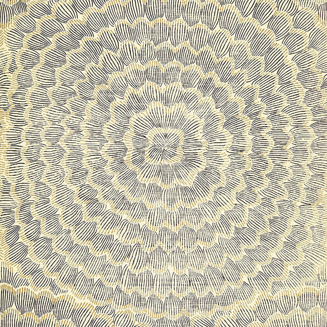 Feather Bloom Sisal wallpaper in Onyx & Gold by Celerie Kemble for Schumacher, featuring overscale blossoms in a radiating pattern on a natural sisal ground.