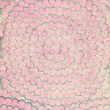 Feather Bloom Sisal wallpaper in Fuchsia & Jet by Celerie Kemble for Schumacher, featuring overscale blossoms in a radiating pattern on a natural sisal ground.
