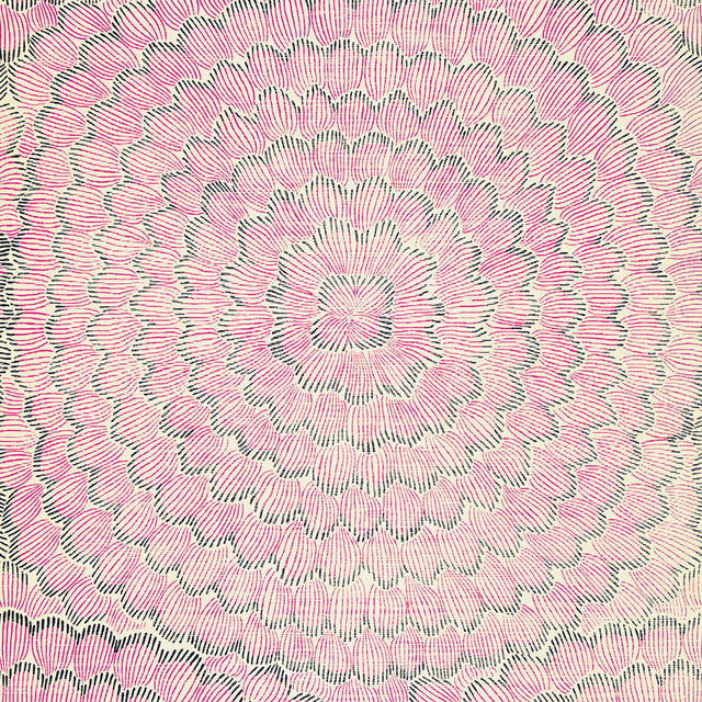 Feather Bloom Sisal wallpaper in Fuchsia & Jet by Celerie Kemble for Schumacher, featuring overscale blossoms in a radiating pattern on a natural sisal ground.
