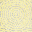 Feather Bloom Sisal wallpaper in Sun & Fog by Celerie Kemble for Schumacher, featuring overscale blossoms in a radiating pattern on a natural sisal ground.