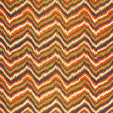 Multicolored bargello zigzag pattern printed on woven sisal wallcovering by Schumacher, designed by Celerie Kemble.