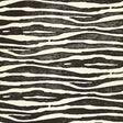 Ripple Sisal wallpaper in Zebra by Celerie Kemble for Schumacher, hand-printed on textured sisal with an exotic zebra stripe pattern.