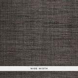 Weston Raffia Weave wallpaper in Charcoal by Schumacher, featuring a textured, woven look in a dark neutral tone.