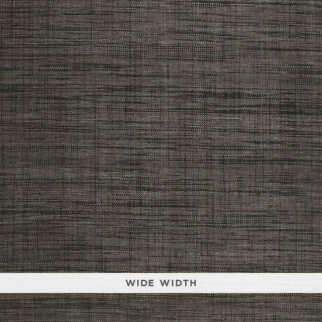 Weston Raffia Weave wallpaper in Charcoal by Schumacher, featuring a textured, woven look in a dark neutral tone.