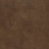 Textured brown faux leather wallcovering in Black Walnut colorway from Schumacher's Luxe Lodge collection, Amarillo pattern.