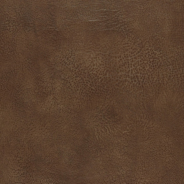 Textured brown faux leather wallcovering in Black Walnut colorway from Schumacher's Luxe Lodge collection, Amarillo pattern.