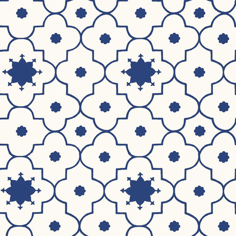 Taj Trellis wallpaper in Jaipur Blue by Schumacher, featuring a bold geometric trellis pattern in blue and white.