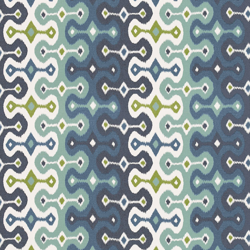 Darya Ikat Sidewall wallpaper in Sky by Schumacher, designed by Martyn Lawrence Bullard. Blue, green, and white ikat pattern wallcovering in a modern interior setting.