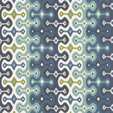 Darya Ikat Sidewall wallpaper in Sky by Schumacher, designed by Martyn Lawrence Bullard. Blue, green, and white ikat pattern wallcovering in a modern interior setting.