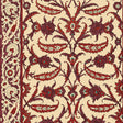 Topkapi Pomegranate wallpaper by Schumacher featuring an Ottoman-inspired floral and vine pattern in rich reds and creams, shown in a restaurant interior and close-up.