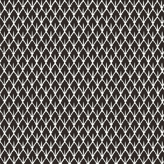 Mughal Leaf Noir wallpaper by Schumacher, designed by Martyn Lawrence Bullard. Black and white tightly patterned leaf print.