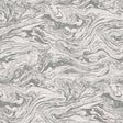 Romeo Carrara marbled faux effect wallpaper by Schumacher, designed by Martyn Lawrence Bullard, shown in a styled interior.