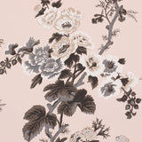 Pyne Hollyhock Blush floral wallpaper by Schumacher, featuring hand-screened chintz pattern with large hollyhock flowers on a blush pink background.