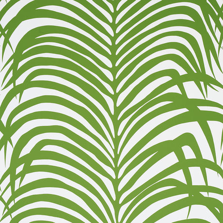 Zebra Palm Jungle wallpaper by Schumacher featuring bold green palm fronds on a white background, shown in various interior settings.