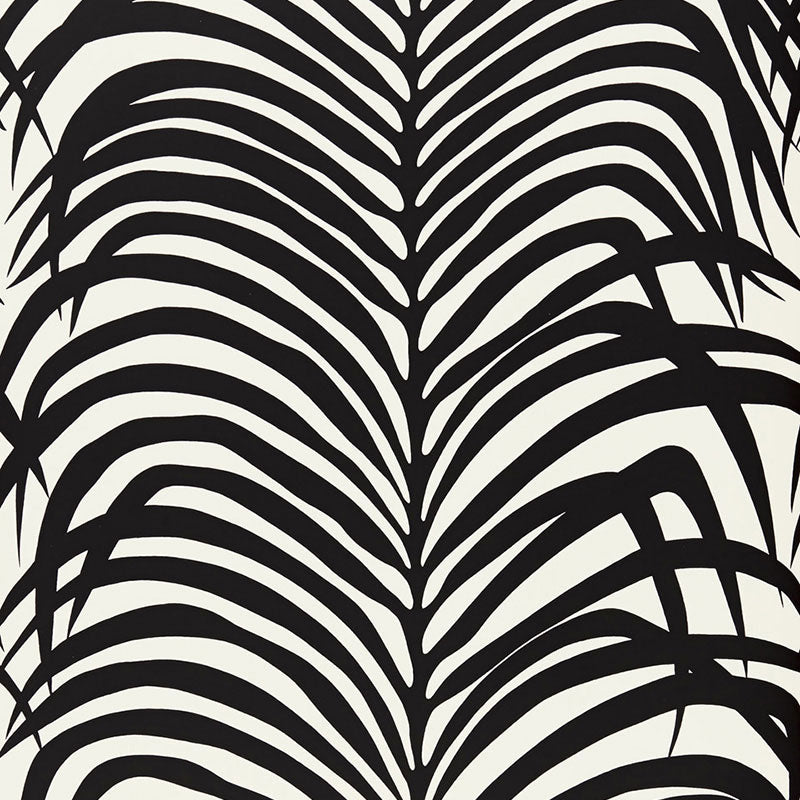 Zebra Palm Ebony wallpaper by Schumacher featuring bold black palm leaf silhouettes on a white background.