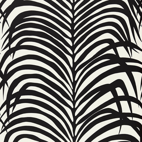 Zebra Palm Ebony wallpaper by Schumacher featuring bold black palm leaf silhouettes on a white background.