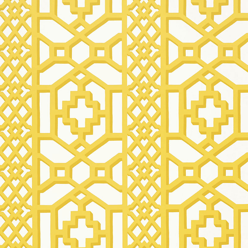Zanzibar Trellis Canary by Schumacher - a bold yellow geometric trellis wallpaper pattern in a bright, modern room setting.