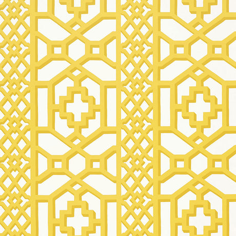 Zanzibar Trellis Canary by Schumacher - a bold yellow geometric trellis wallpaper pattern in a bright, modern room setting.
