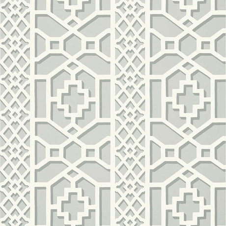 Zanzibar Trellis wallpaper in Cloud by Schumacher features a geometric fretwork trellis pattern inspired by Elsie de Wolfe, shown in soft neutral tones.