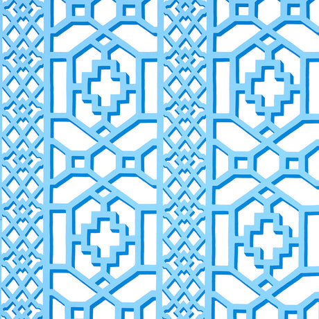 Zanzibar Trellis blue geometric trellis wallpaper by Schumacher shown in a kitchen interior and close-up pattern views.