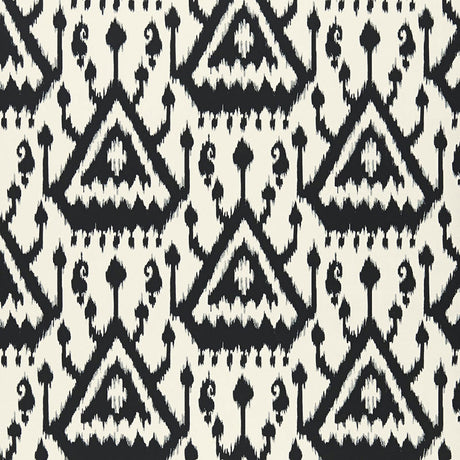 Vientiane Ikat Ebony by Schumacher - black and white geometric ikat wallpaper in a modern interior setting