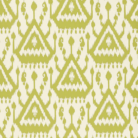 Vientiane Ikat wallpaper in Palm colorway by Schumacher, featuring a bold geometric ikat pattern in green and white.