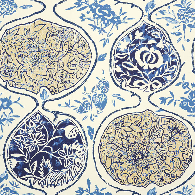 KATSUGI wallpaper in blues and cream with intricate floral and medallion patterns, styled in a bright living room interior.