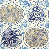 KATSUGI wallpaper in blues and cream with intricate floral and medallion patterns, styled in a bright living room interior.