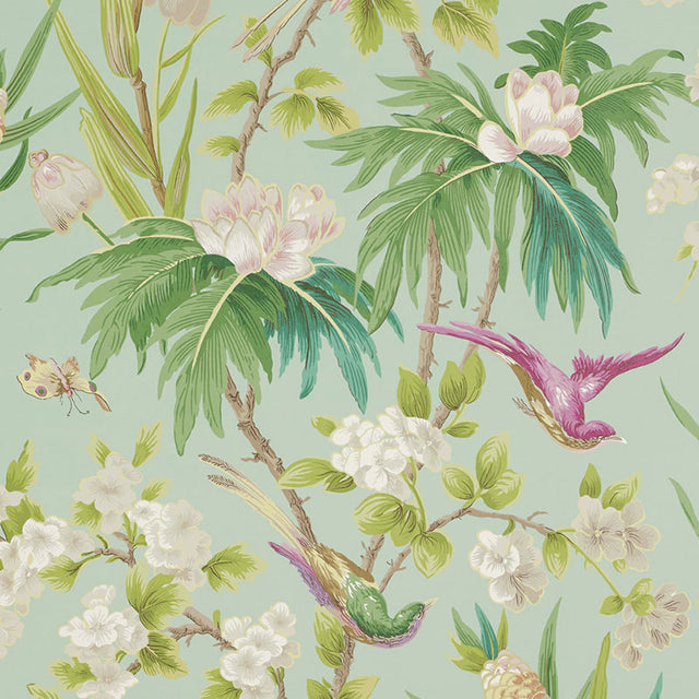 Seychelles Sea wallpaper by Schumacher featuring brightly plumed birds and lush tropical blooms on a sea green background.