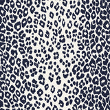 Iconic Leopard Ink wallpaper by Schumacher featuring a bold animal print pattern in deep blue and white.