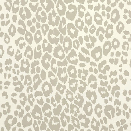 Iconic Leopard wallpaper in Linen by Schumacher, featuring a classic animal print pattern in neutral tones, shown in styled interior settings.