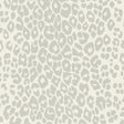 Iconic Leopard Cloud wallpaper by Schumacher shown in a modern interior and close-up of the animal print pattern.