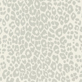 Iconic Leopard Cloud wallpaper by Schumacher shown in a modern interior and close-up of the animal print pattern.