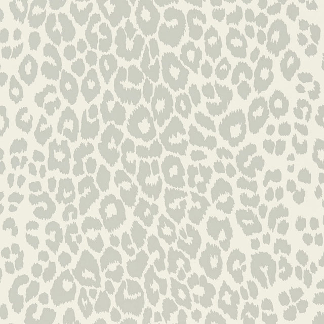 Iconic Leopard Cloud wallpaper by Schumacher shown in a modern interior and close-up of the animal print pattern.