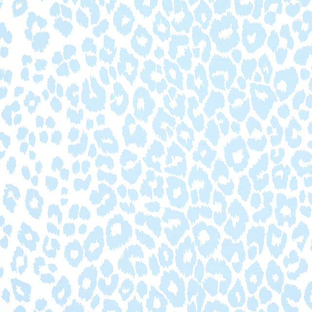 Iconic Leopard wallpaper in Sky blue by Schumacher, featuring a playful animal print pattern in a soft blue and white colorway.