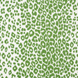 Iconic Leopard green animal print wallpaper by Schumacher, shown in a room setting and close-up detail.