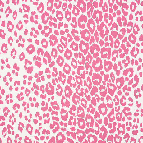 Iconic Leopard wallpaper in pink by Schumacher, featuring a bold animal print pattern in a vibrant pink and white colorway.