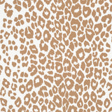 Iconic Leopard wallpaper in camel by Schumacher, featuring a bold animal print pattern in tan and white.