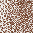 Brown and white leopard print wallpaper from Schumacher's Preppy Chic collection, shown in close-up and styled room settings.